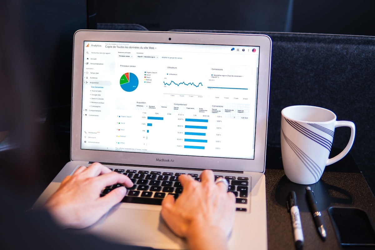 A business owner working on SEO — small consistent actions compound into significant rankings